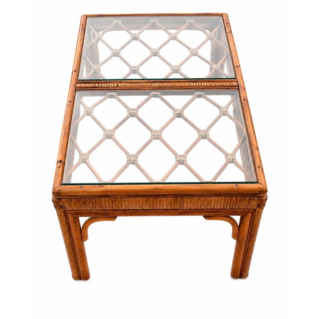 Bring timeless coastal charm to your home with this beautifully crafted vintage split bamboo and rattan coffee table...