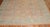 An early 20th century antique Turkish Oushak rug. Soft peach field and powder blue border. Measures: 11'6'' x 13'.
