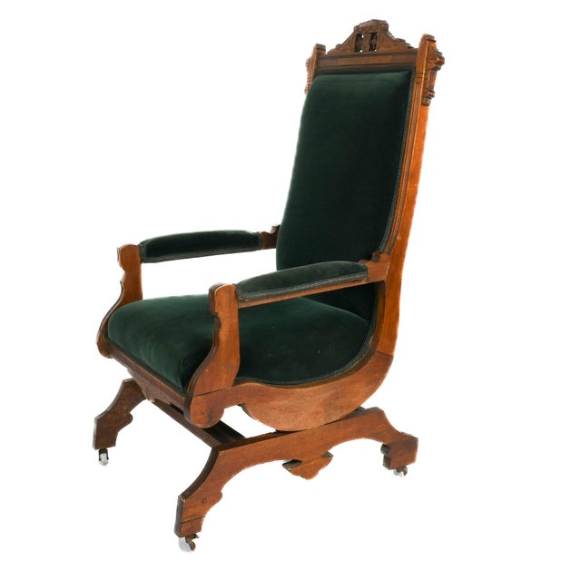 This antique Eastlake platform rocking chair is a striking example of late 19th-century design, combining architectural...