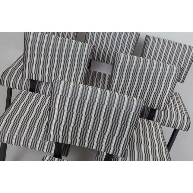 Functionalism dining set of six pieces of chairs in black polish, newly upholstered to the fabric Backhausen according to...