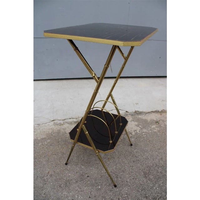 Italian Brass and Wood Magazine Rack, 1950s, in Very Good conditions. Designed 1950 to 1959