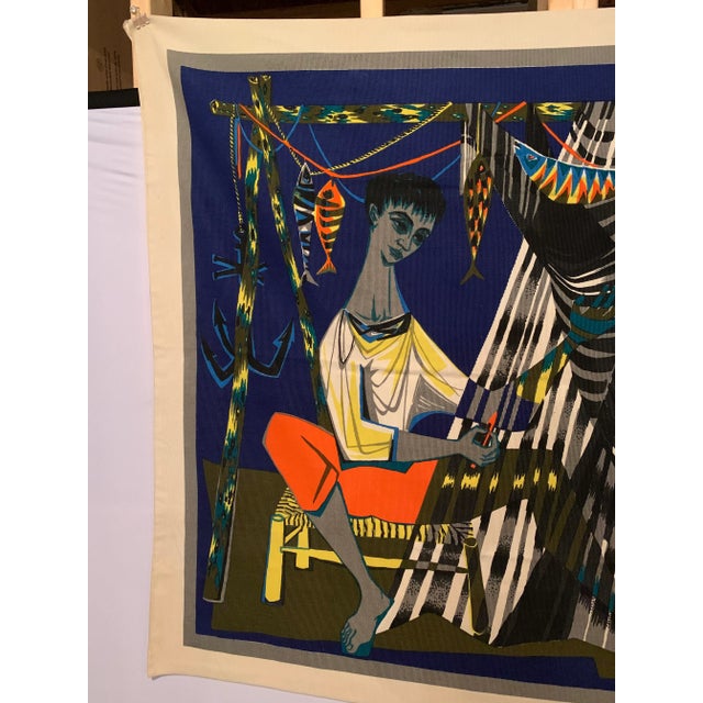 A bright, colorful modernist tapestry signed by Robert Debieve. France, circa 1950. Entitled “Les remailleur de filets”...