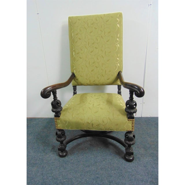 Victorian throne style chair , solid oak , pierced carved arm supports and legs, cross stretcher base , light green leaf...