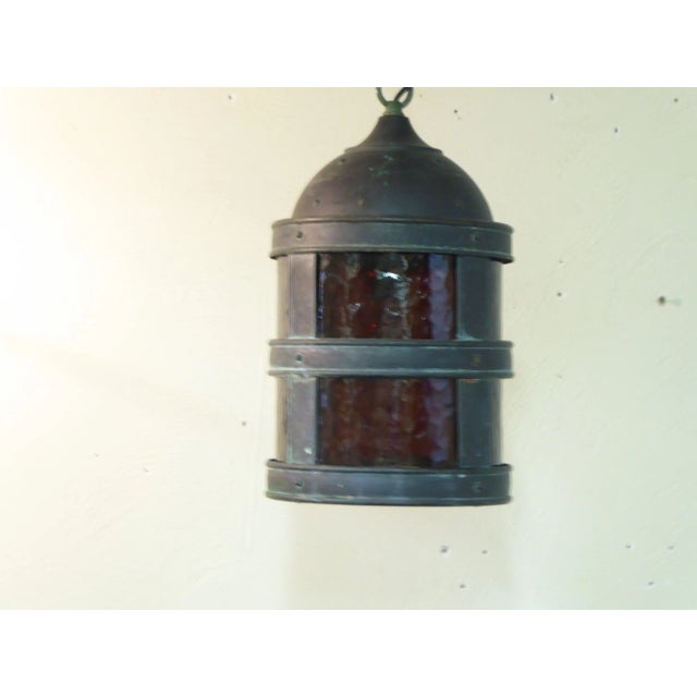 This Bronze outdoor lantern comes with 8" of chain and a canopy, the body of the lantern measures 14.5"H, uses one Edison...