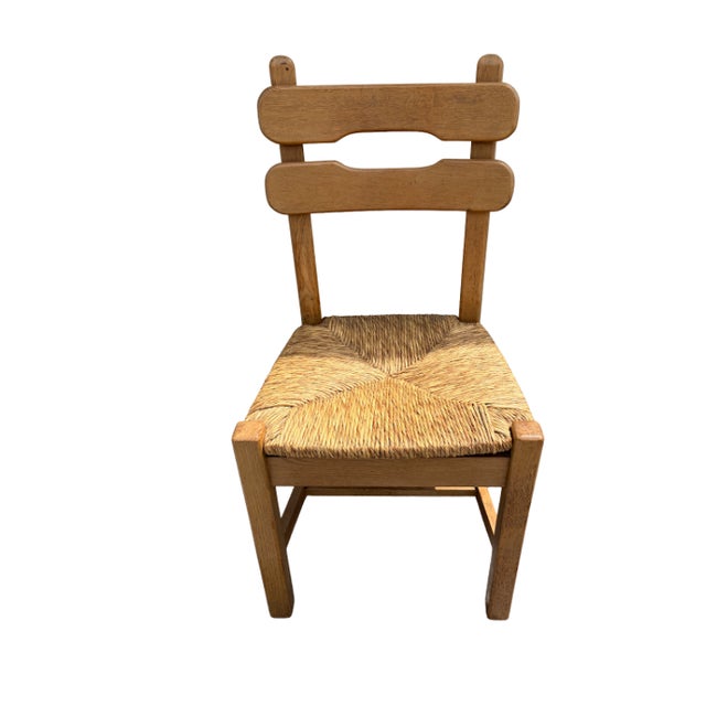 Rare Set of 8 Vintage Brutalist Dining Chairs, in the Style of DePuydt. Solid oak frames with woven rush seats. Origin is...
