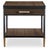 Single soft-close drawer with aged bronze hardware pull and open shelf below