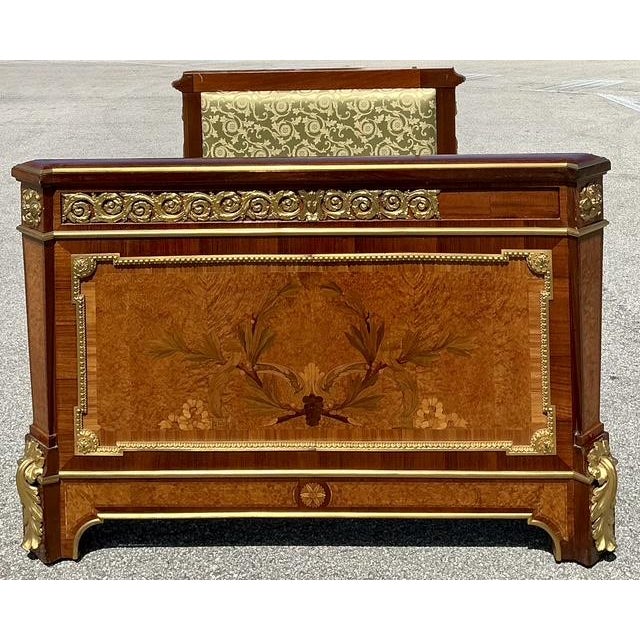 Embodying the pinnacle of 19th-century French refinement, this Louis XVI-style twin daybed is a masterclass in...