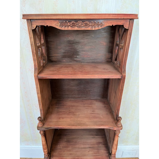 Adorable petite mahogany bookshelf. Perfect for a small space like a child’s bedroom. Feminine lines and design. Finish...