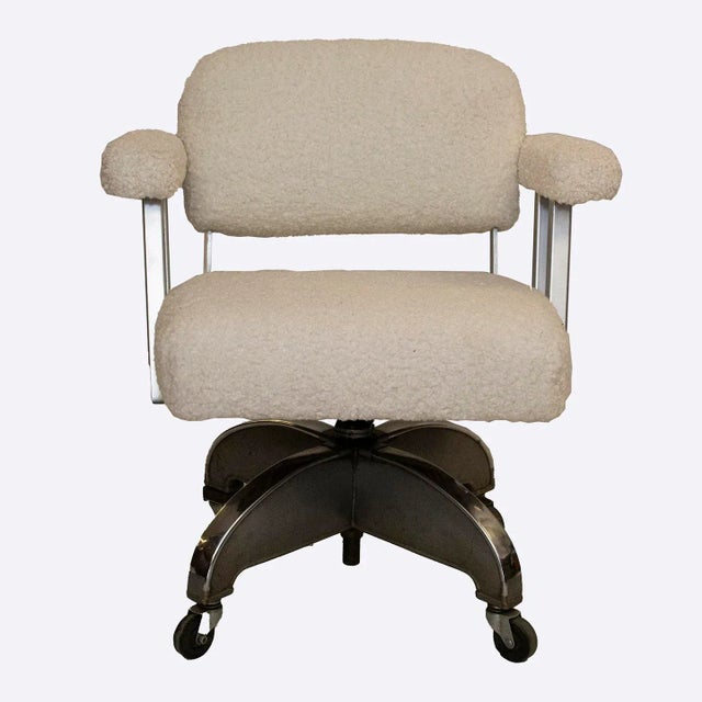 Vintage DoMore Office Swivel Chair Upholstered in White Faux Shearling. The white faux shearling upholstery offers a...