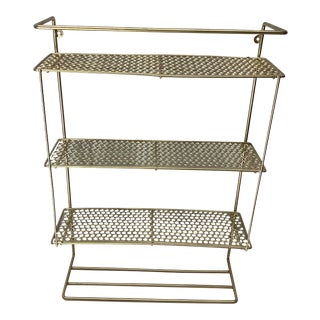 Vintage Mid Century Modern Atomic Pierced Metal Wall Shelf in Gold For Sale