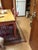 Distressed-Painted Hard-Wood Dining Table With Four Cross-Backed Chairs Featuring Natural Hand-Woven Seats For Sale In Los Angeles - Image 6 of 6