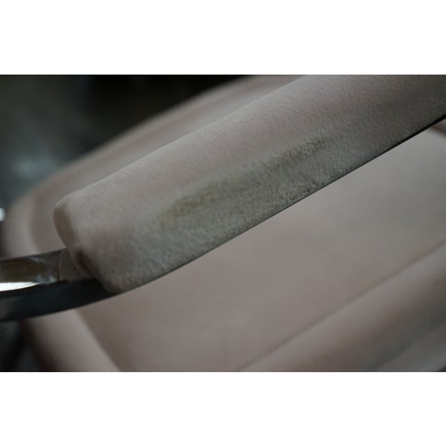 Vintage Mid-Century Modern rocking chair, in the manner of Maison Jansen circa 1970. This chair is a modern French design....