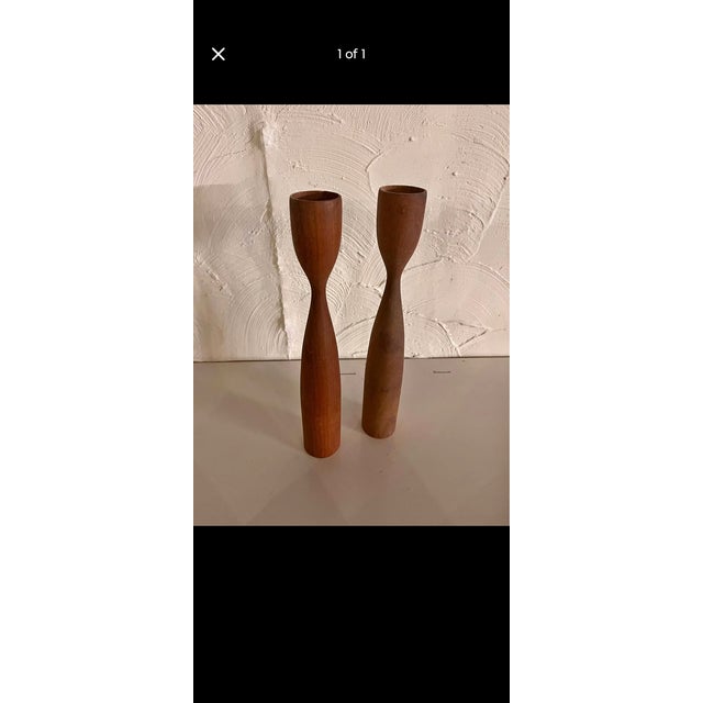 Material: Solid teak wood. Design: Sculptural hourglass or "tulip" shape popular in Scandinavian modern design. Features:...