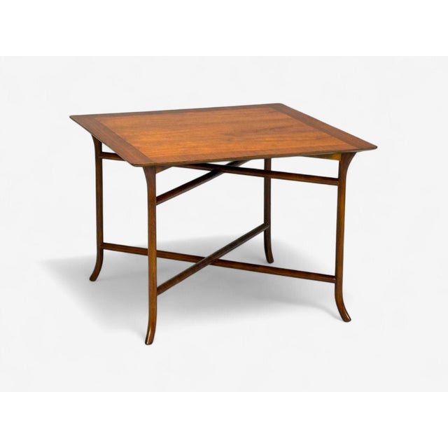 T.H. Robsjohn-Gibbings, Widdicomb, American Mid-Century Modern, Walnut, "Saber Leg" End Table, USA, 1960s A unique fully...