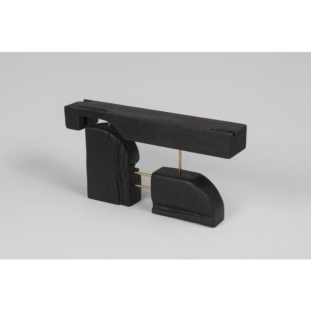 Unique wooden functional sculpture usable as a multifunctional piece such as a side table, stool, or decorative object. It...