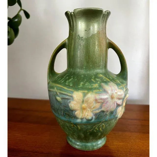A gorgeous Roseville Cosmos 1939 Vintage green art pottery vase with handles. This spectacular vase is beautifully...