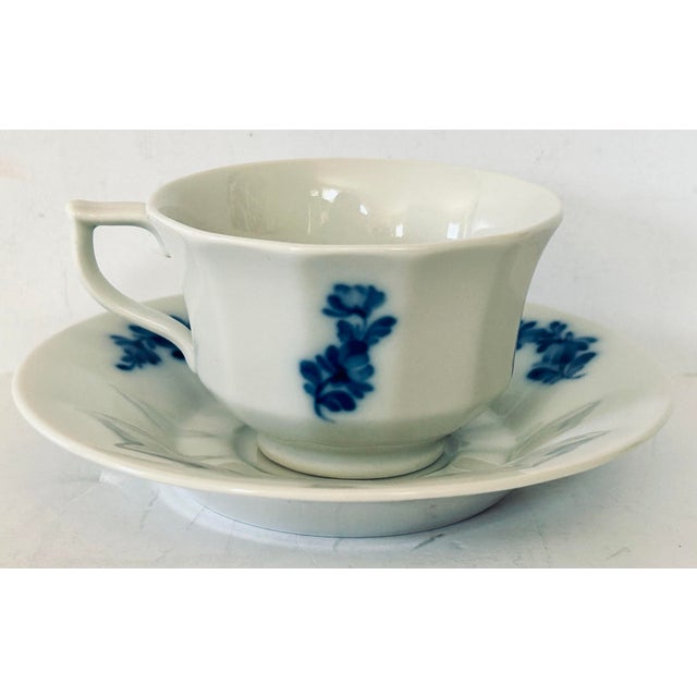 MCM Royal Copenhagen Blue Flower demitasse cup and saucer fluted and beautifully decorated with a variety of flowers....
