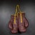 ABOUT An original pair of thick Everlast brown leather boxing gloves stuffed with horse hair. Large "Everlast" tag and...