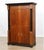 Elegant Hungarian Biedermeier secrétaire crafted in richly figured walnut veneer with a molded foliate and beaded cornice...