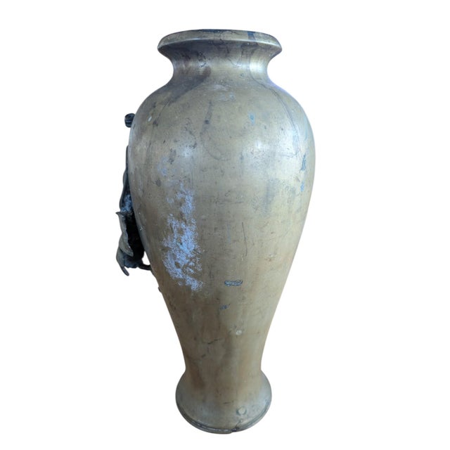 Wonderful heavy bronze vase from Japan. Grape and leaf motif. Stands 12" high, 6" in diameter