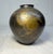 This antique Japanese bronze vase features beautiful hand tooled frog scenes accented by a lovely hand hammered finish....