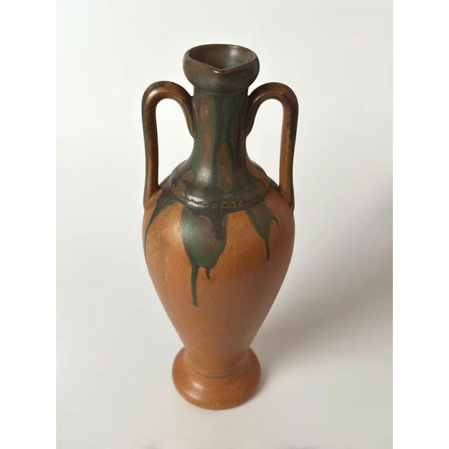 A ceramic amphora-form liqueur vessel produced by Denbac, France, in the 1950s for the iconic French spirits brand...