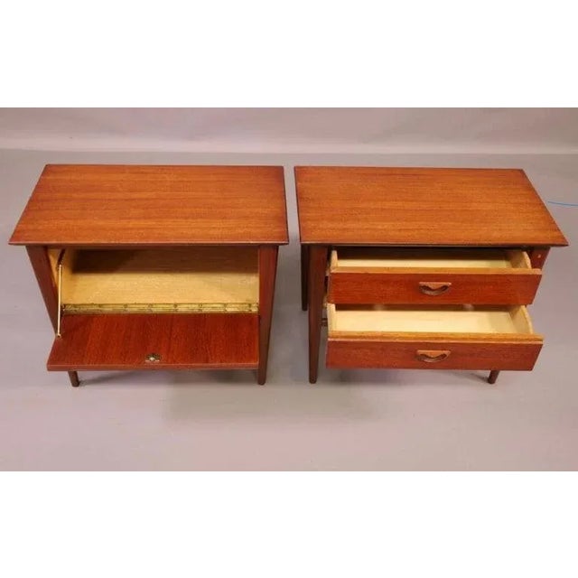 Lovely dimunitive pair of teak nightstands or end tables designed by Louis Van Teeffelen for Webe Meubelen. A matched pair...