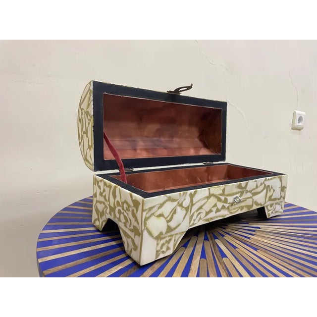 Elevate your home décor with this handcrafted wooden box, beautifully inlaid with natural , durable metal, and high-...