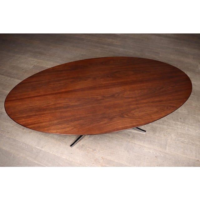 Impressive large florence knoll dining table made with walnut veneer, and steel leg, 1960s an architectural example of...