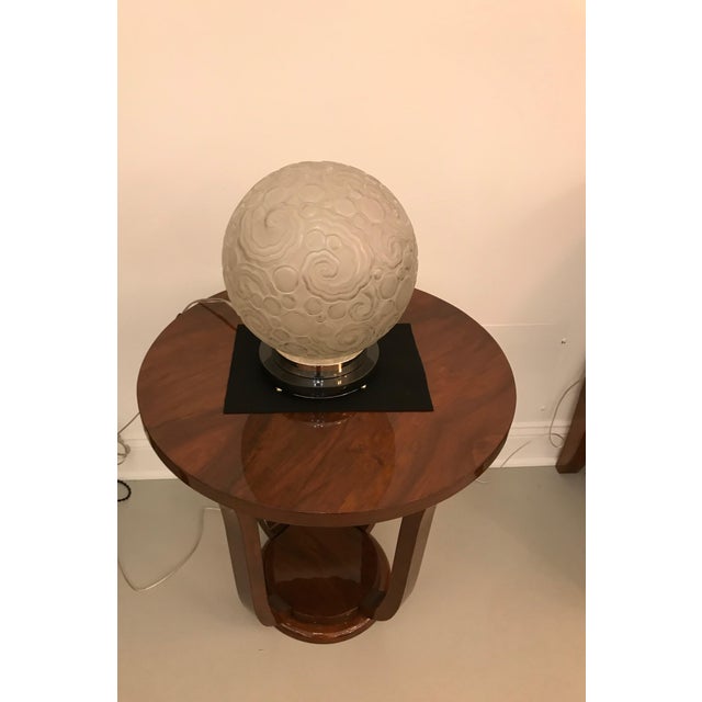 Rare French Art Deco table lamp created by "Marius Ernest Sabino" (1878-1961). The glass shade is clear frosted glass with...