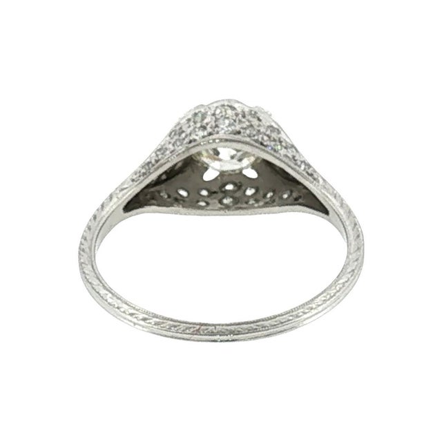 An early 20th-century platinum engagement ring featuring a 0.95-carat Old European cut diamond, with K color and VS2...
