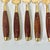 Brass 1950s Vintage Hollywood Regency Chinoiserie Appetizer-Dessert Brass & Rosewood Forks - Set of 8 For Sale - Image 8 of 10