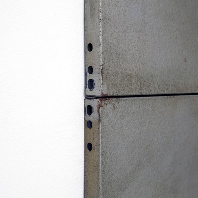 This Minimalist piece was made by Ramon Horts. It belongs to the series of metal compositions made for a solo exhibition...