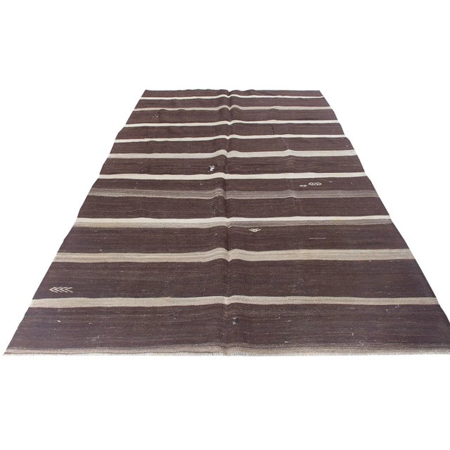 Vintage handwoven decorative kilim rug from Afyon region of Turkey. Approximately 50-60 years old. In very good condition.