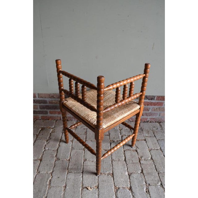 20th-century Dutch oak corner chair, hall chair. Height: 71 cm. Width: 43 cm. Depth: 43 cm. Seat height: 41 cm. With a...