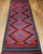 A mid-20th century Moroccan kilim of striking beauty and remarkable versatility, this wide runner features a bold...