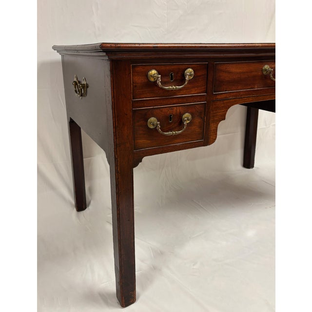 George III 18th Century Writing Table with concealed casters in legs and original brasses. Beautiful patina on Mahogany...