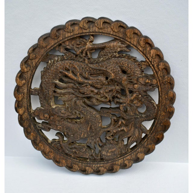 Vintage (1940's) Round Plaque has a Chinese/Mystical Style. Made of Wood. Hand Carvings w/Dragon Motif. The Measurements:...