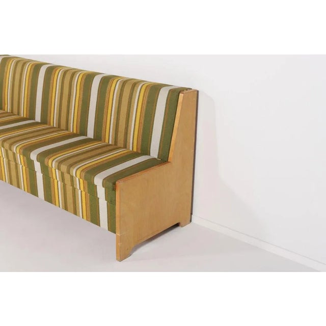Mid-Century Modern bench-bed produced in Sweden, 1960’s. It has MDF frame veneered in maple, upholstered in striped wool...