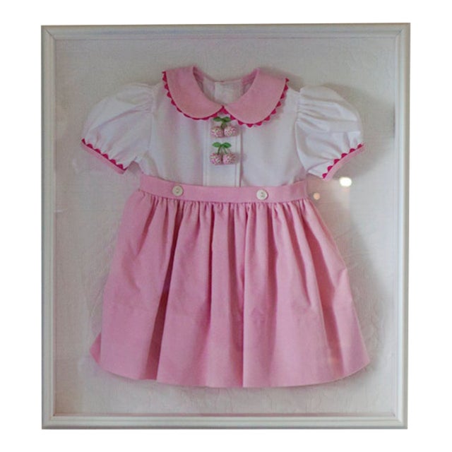 Nursery Art: Women's Exchange Pink Cherry Dress Framed in a White Wood Shadow Box For Sale