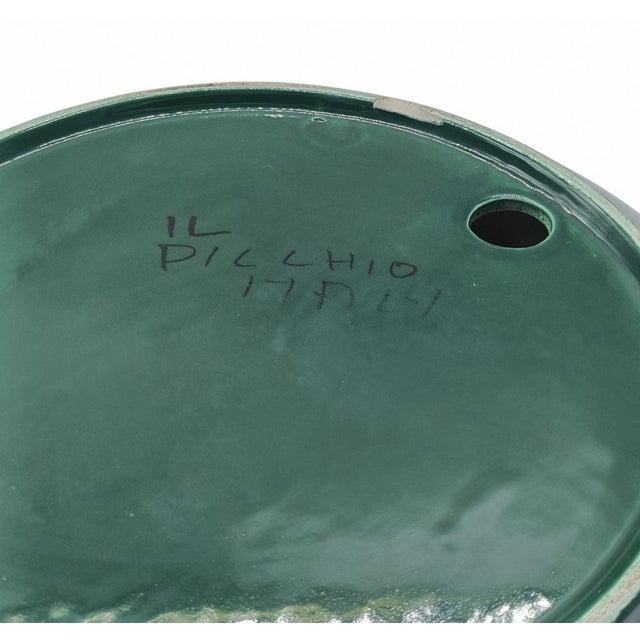 This polished glazed ceramic ashtray is an icon of 1970s Italian design, designed by renowned designer Enzo Bioli for the...