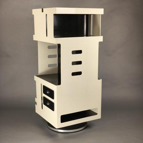 Elegant double-sided rotating bar cabinet, in the style of Gio Colombo, with a 1960s design. Structure in black lacquered...