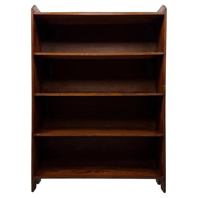 A handsome and beautifully proportioned early 20th-century Edwardian oak open bookcase, combining generous display space,...