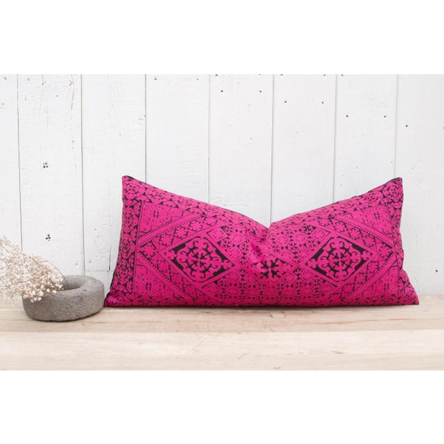 This Swati tribal pillow was created using intricately embroidered fabric from Swat Valley, where "phulkari" embroidery...