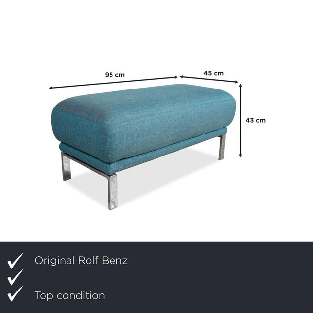 The Rolf Benz fabric stool in blue/turquoise impresses with its modern design, high-quality craftsmanship, and elegant...