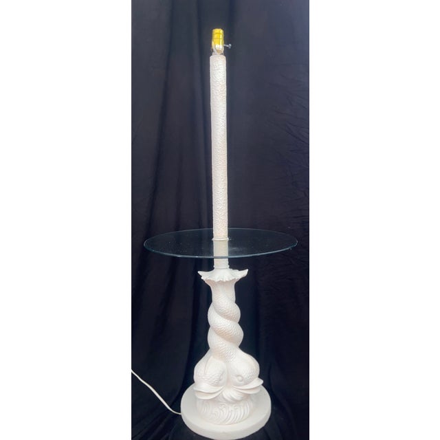 Offered is a vintage double dolphin floor lamp with transparent not smoked glass tray table. 1960’s Excellent vintage...