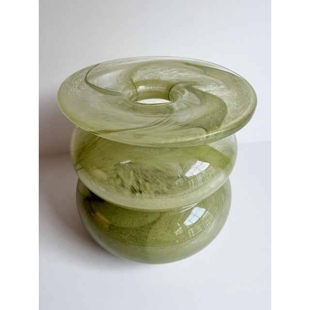 Handblown studio glass vase in a luminous chartreuse green with soft marbled movement throughout the glass. Sculptural...