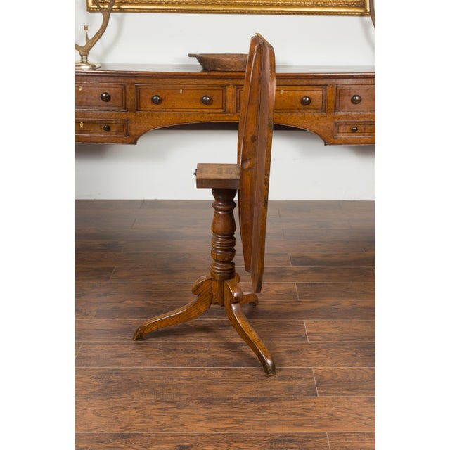 Wood English 1870s Oak Tilt-Top Table with Turned Pedestal and Tripod Scrolling Feet For Sale - Image 7 of 9