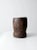 An antique wooden mortar, hand-carved from rustic wood and shaped into a substantial vessel with a generously sized basin....