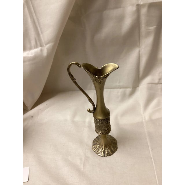 This is primarily a decorative item, suitable for fresh, seal, or dried flowers or as a standalone accent piece. It...